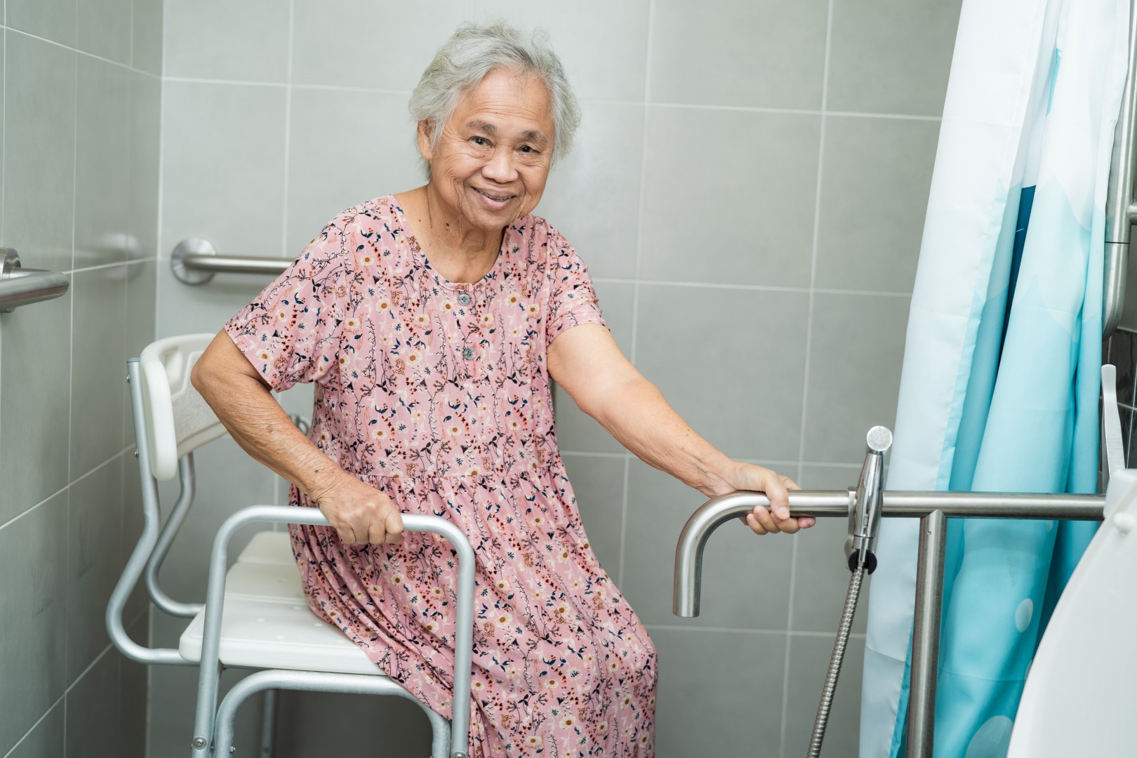 Woman Using Handicap Accessible Shower